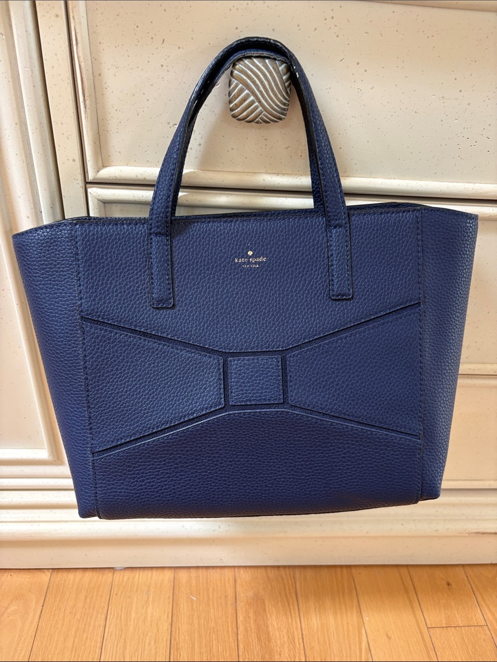 kate spade bow terrace tote navy pebbled leather tote with bow-panel detail